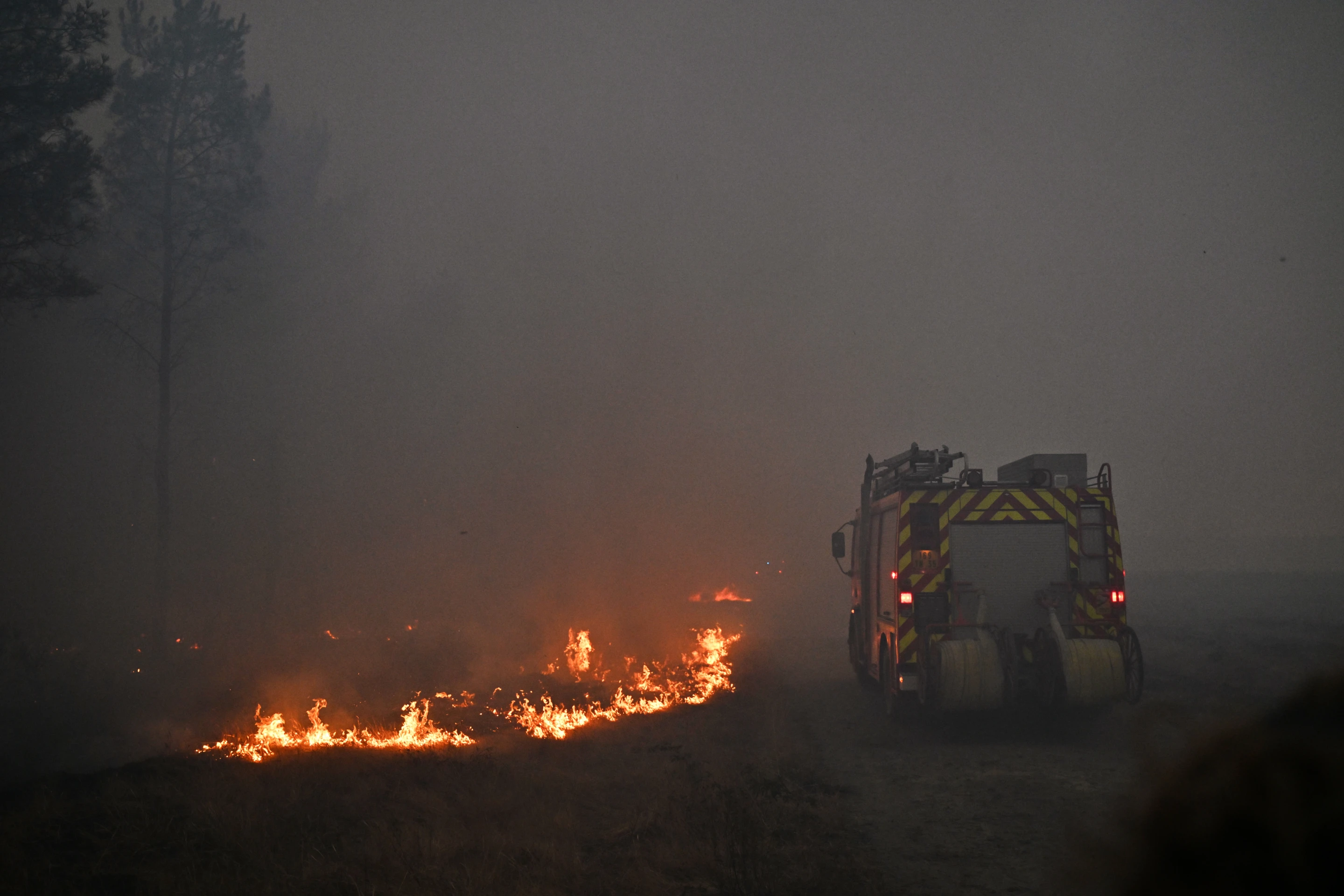 Macron Calls Crisis Meeting as Monster Wildfires Drive 250,000 From Their Homes